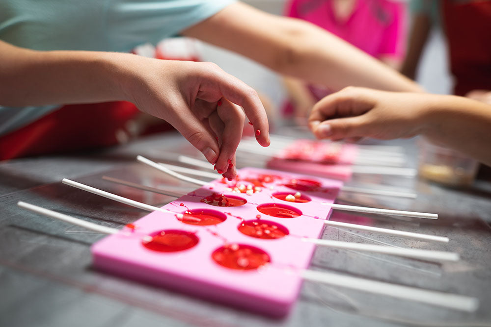 Six Strawberry Lolli Pops